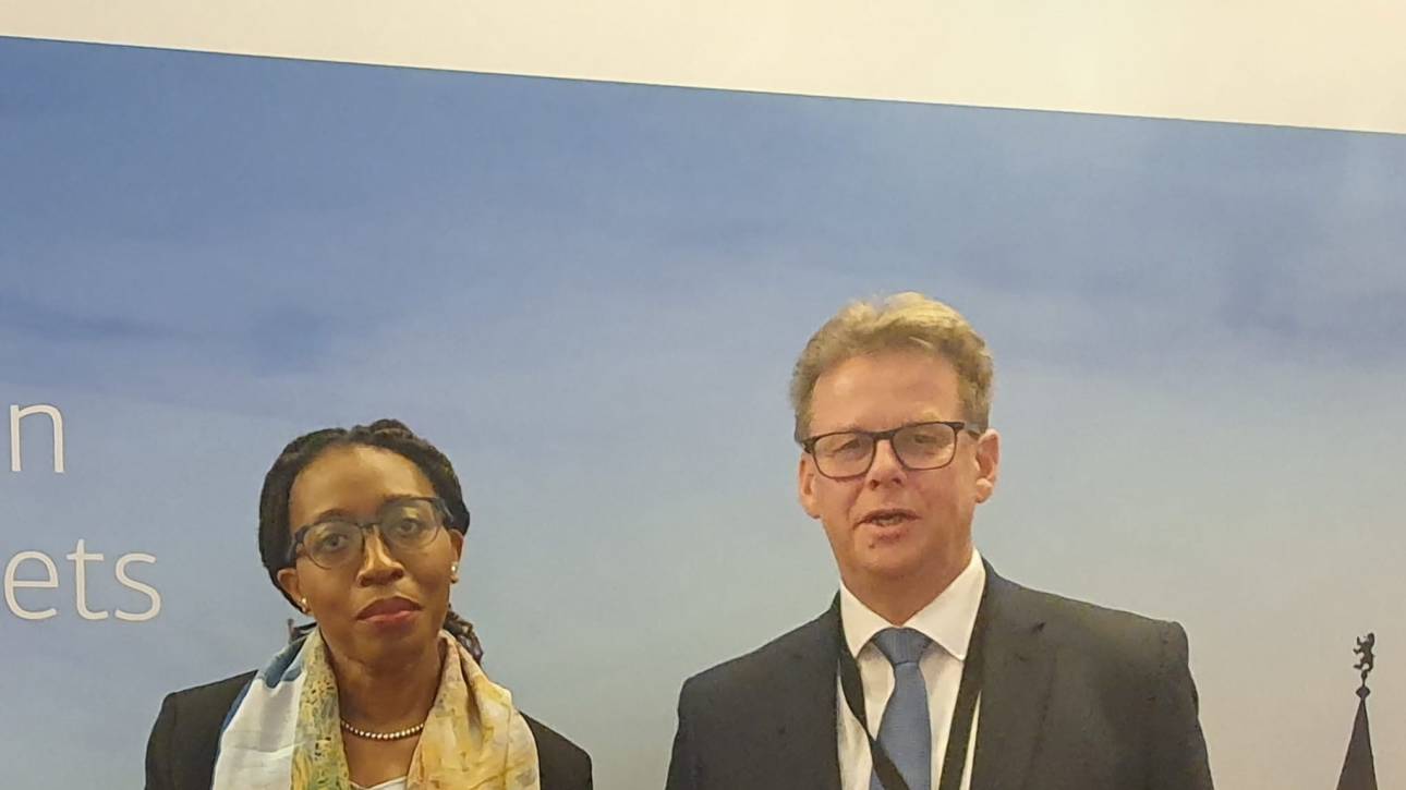 Carl Heinrich Bruhn with Dr. Vera Songwe, Chair of the Board, Liquidity and Financial Stability Facility